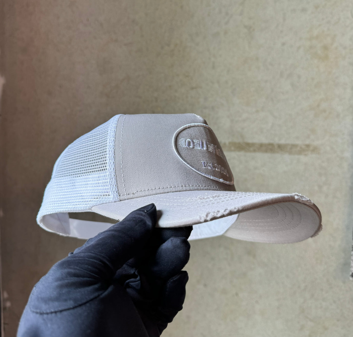 Grey and white trucker cap